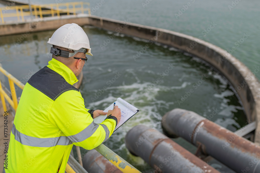 Environmental engineers work at wastewater treatment plants,Water supply engineering working at Water recycling plant for reuse Environmental engineers work at wastewater treatment plants,Water supply engineering working at Water recycling plant for reuse