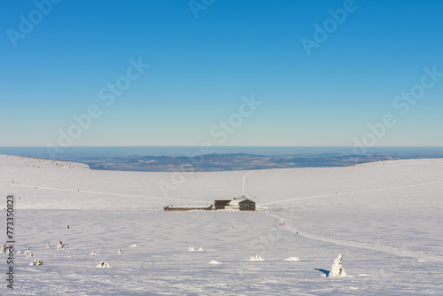 Meadow Hut , ski lodge, krkonose mountains Czech Republic. Winter sunny day.