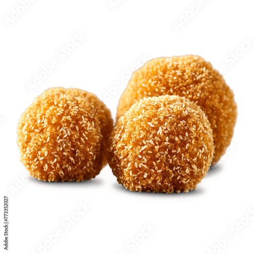 Sesame balls crispy and seed coated in a transparent glass container low