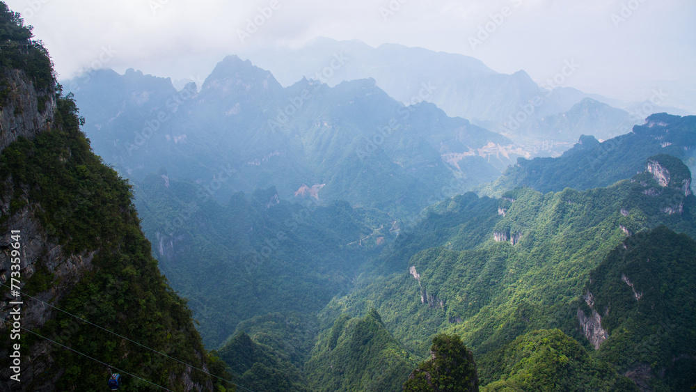 Fototapeta premium Zhangjiajie, China - September 29 2015: Geological wonders and natural rock pillars in Zhangjiajie National Park in Hunan China