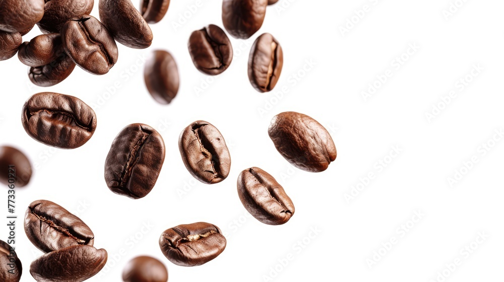 Flying roasted coffee beans isolated on white background with free place for text. Banner for restaurants, cafe, menu design Flying roasted coffee beans isolated on white background with free place for text. Banner for restaurants, cafe, menu design