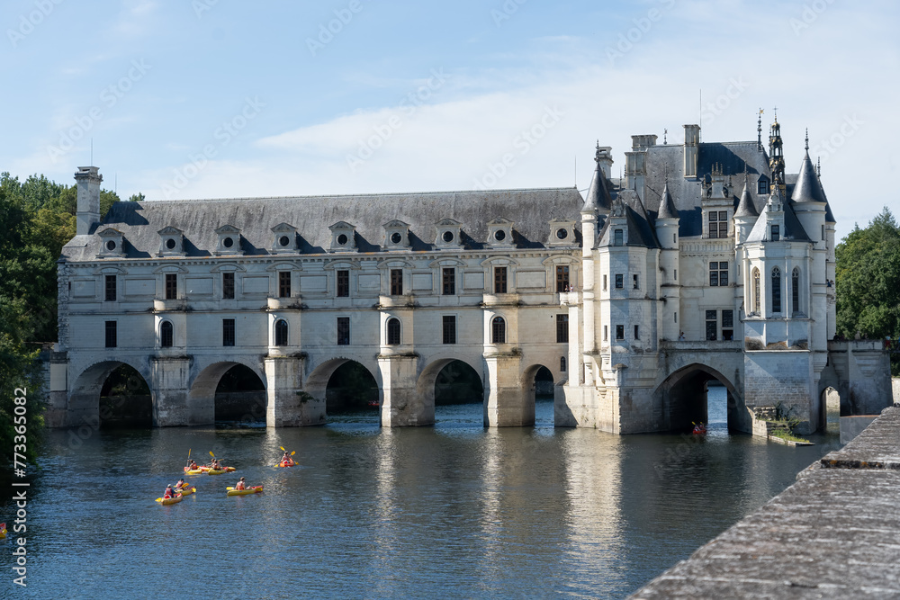 canoeists on the river at Chateau de Chenonceau Castle, France