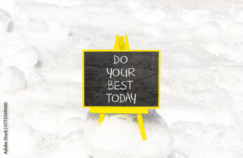 Do your best today symbol. Concept words Do your best today on beautiful black chalk blackboard. Beautiful white snow background. Business motivational do your best today concept. Copy space.