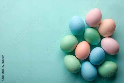 Easter eggs with card, blue background, pastel colors.