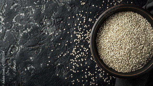 Top view many raw white quinoa seeds on bowl isolated black background. AI generated image