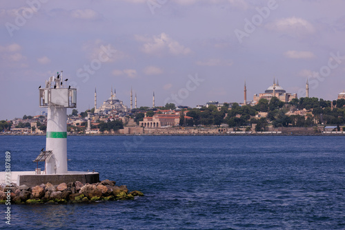 Embankment and sea, beach and buildings of a southern city, public place in Turkey, on a summer sunny day