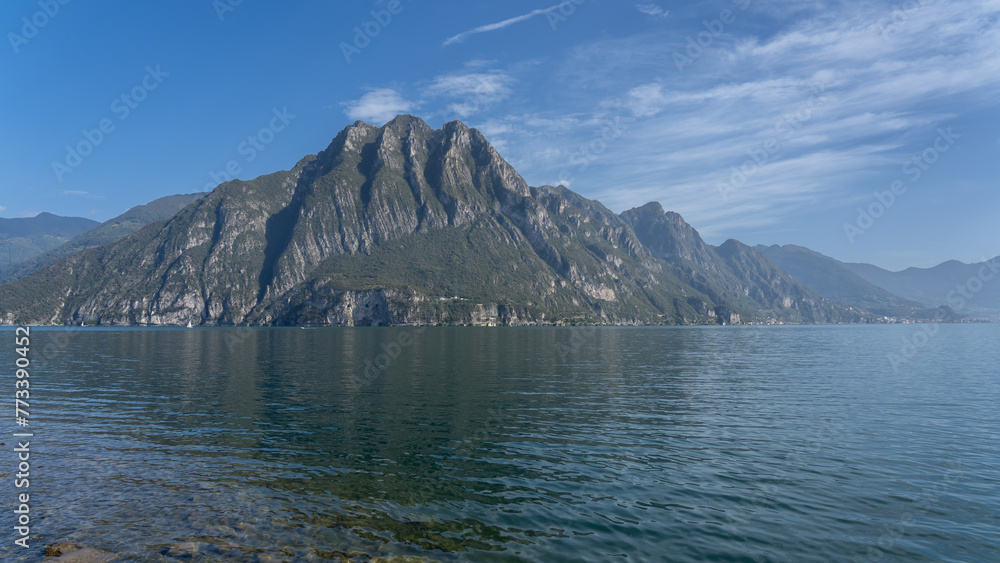 Amazing landscape at Lake Iseo. An alpine lake in north of Italy. Famous tourist destination. Natural and holiday contest