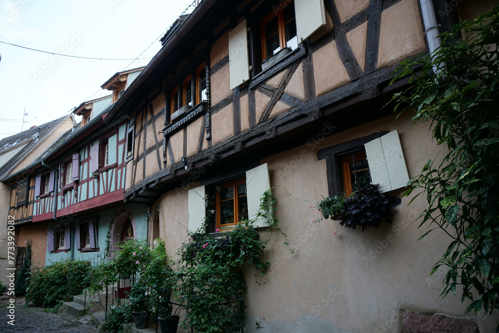 closeup on downtown Eguisheim in eastern France, Alsace with their typical half timbered colorful buildings
