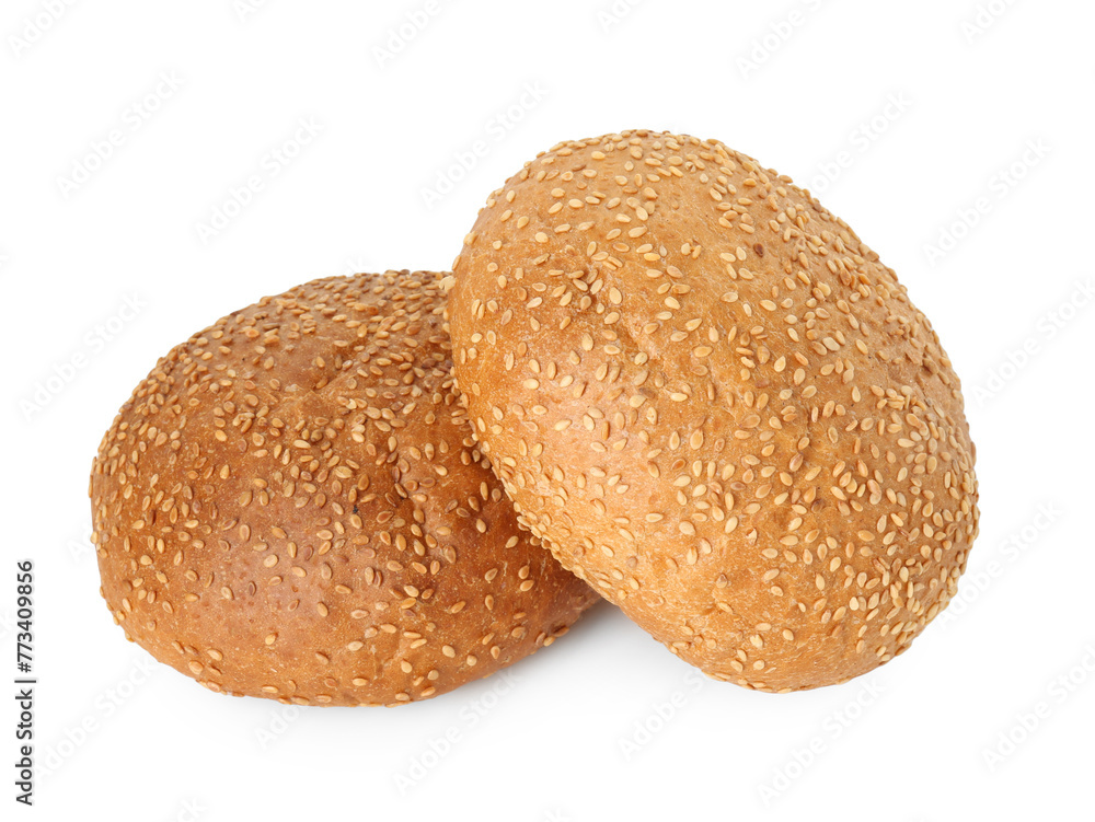 Two fresh hamburger buns with sesame seeds isolated on white Two fresh hamburger buns with sesame seeds isolated on white