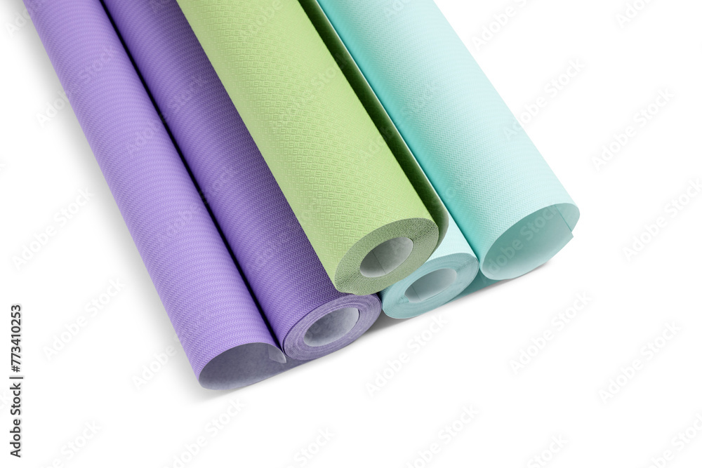 Three colorful wallpaper rolls isolated on white Three colorful wallpaper rolls isolated on white