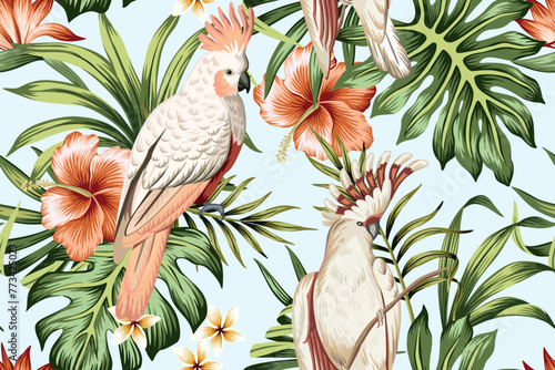 Tropical vintage palm leaves, red hibiscus flower, pink cockatoo parrot floral seamless pattern blue background. Exotic jungle wallpaper. photo