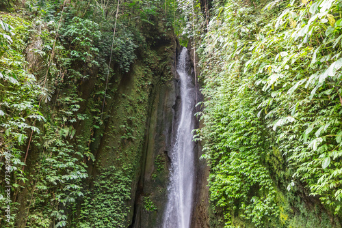 Beautiful view of Leke-leke waterfall in the tropical forest of Bali
