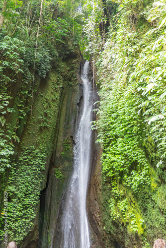 Beautiful view of Leke-leke waterfall in the tropical forest of Bali