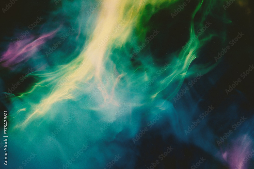 Abstract art. Colorful smoke from vape on a black background
