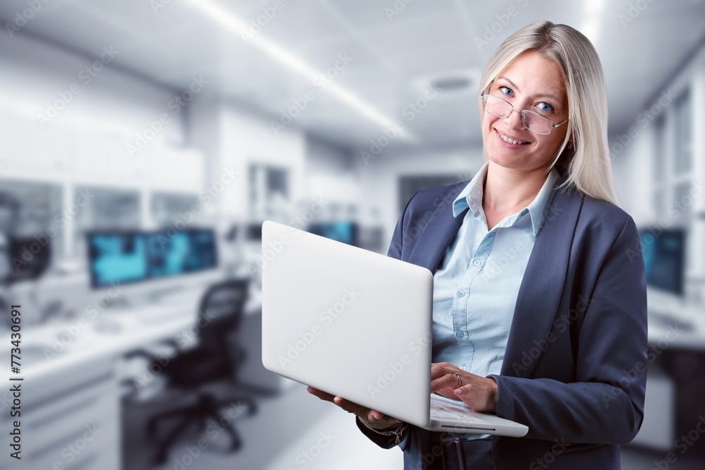 Young employee business woman hold laptop Young employee business woman hold laptop