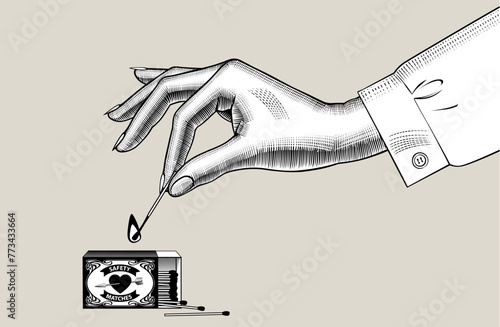 A woman's hand holding a burning match in her fingers and an open matchbox with matches. Vintage black and white engraving stylized drawing. Vector 
illustration