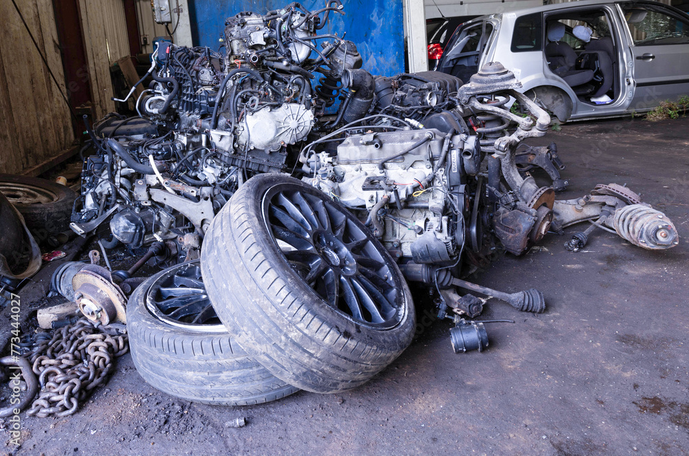 Junkyard in Holland with old and broken cars and photos of carparts