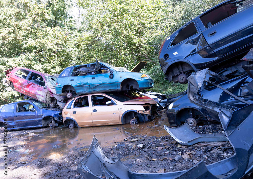Junkyard in Holland with old and broken cars and photos of carparts