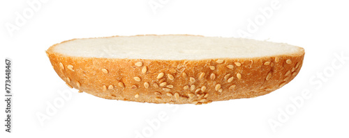Half of fresh burger bun with sesame seeds isolated on white photo