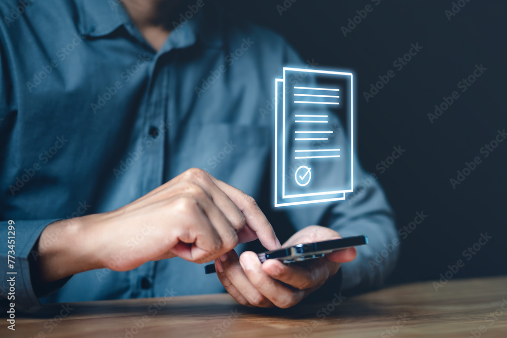 innovation, information, marketing, internet, mobility, technology, working, financial, smartphone, media. A man is using a cell phone to sign a document. Concept of modern technology and the ease. innovation, information, marketing, internet, mobility, technology, working, financial, smartphone, media. A man is using a cell phone to sign a document. Concept of modern technology and the ease.