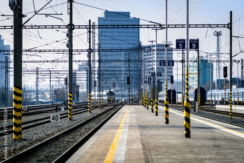Brno, Czech Republic - March 18, 2024: Train platform at the main station in the city center with the modern future in the background.