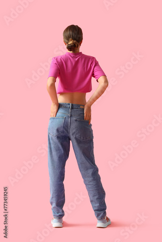 Young woman in stylish jean...
