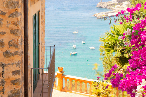 beautiful details of Port Soller harbour, Mallorca at summer with flowers, Spain