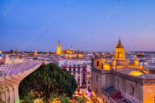Seville City Skyline view with Illuminated Space Metropol Parasol in the Foreground at Dusk, Seville