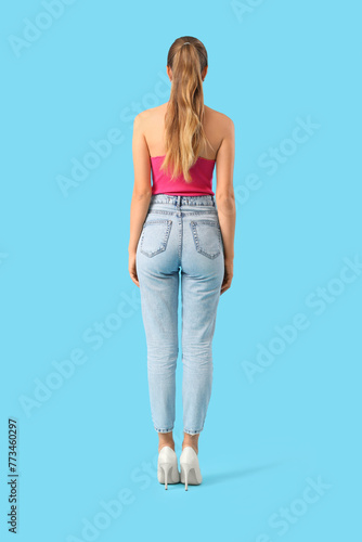 Young woman in stylish jean...