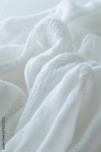 Close up of a white blanket on a bed, perfect for home decor projects
