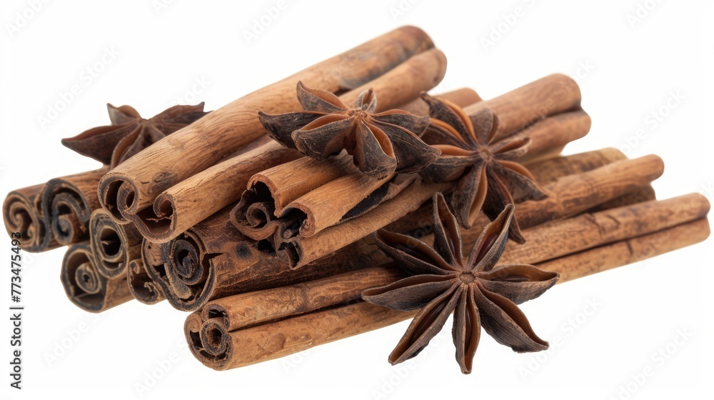 A pile of cinnamon sticks and star anise, perfect for spice lovers and food bloggers A pile of cinnamon sticks and star anise, perfect for spice lovers and food bloggers