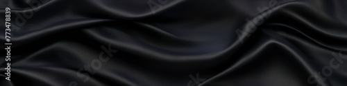 Black panoramic silk background, fabric with blurred satin wavy texture.