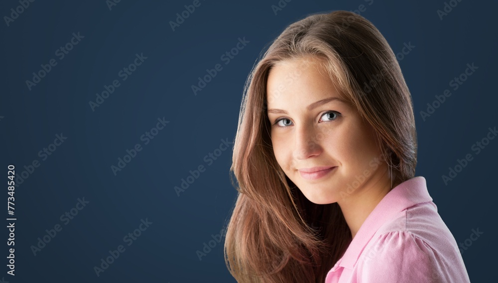 Casual young woman smiling at camera