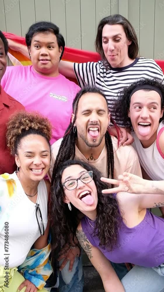 Diverse group of LGBT people having fun celebrating gay pride party festival day. LGBTQIA community concept Diverse group of LGBT people having fun celebrating gay pride party festival day. LGBTQIA community concept