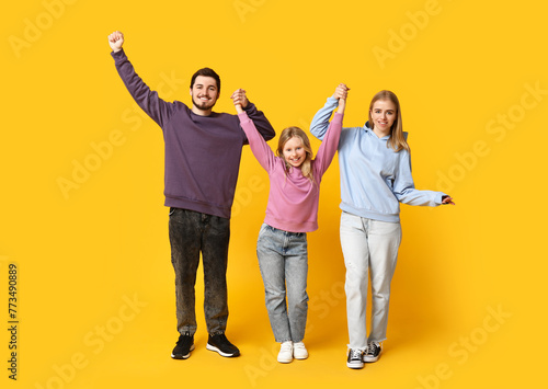 Happy family in stylish den...