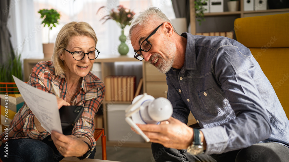 Couple at home connect and install cctv security surveillance camera Couple at home connect and install cctv security surveillance camera