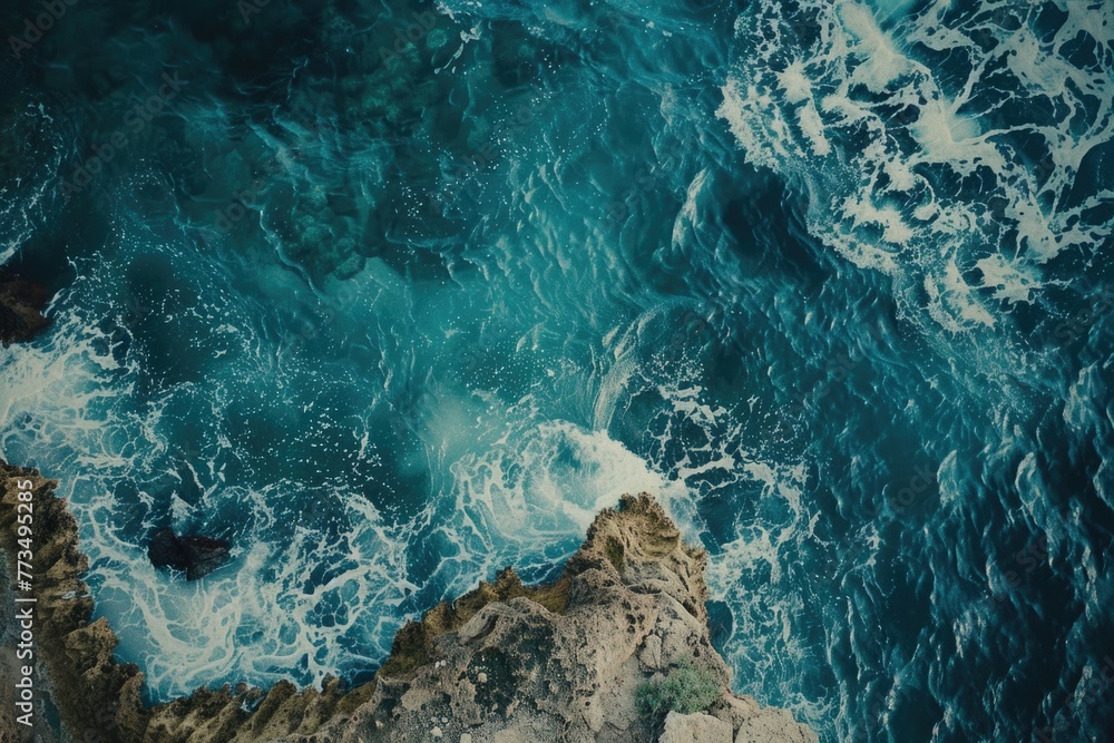 A stunning view of the ocean from a high cliff. Perfect for travel and nature concepts A stunning view of the ocean from a high cliff. Perfect for travel and nature concepts