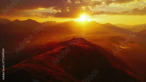 Scenic view of setting sun over majestic mountains. Perfect for travel brochures