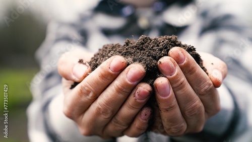 farmer holding soil his hands, earth, black soil earth fertilizers, preparing earth soil for planting seedlings, sprouts, work agriculture, hands close-up, farmer working field, farm care, smart earth