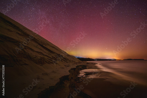 Aurora borealis over the sand dunes at night