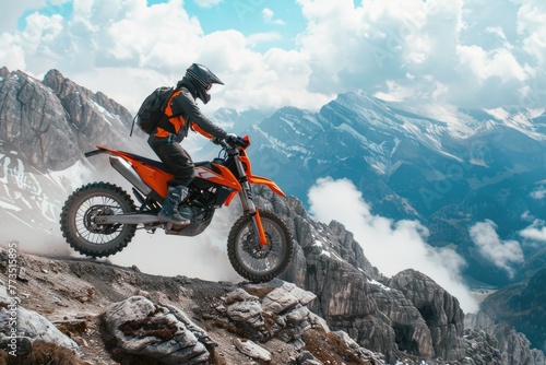 A man riding a dirt bike on top of a mountain. Suitable for outdoor sports and adventure concepts