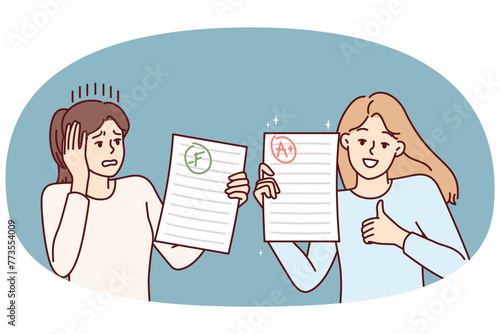 Two teen girls demonstrate sheets paper with positive and negative mark for completing exam task. Happy and upset female students share final test results for college admissions