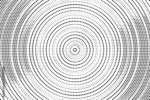 Halftone pattern background with radial effect, round spot shapes, vintage or retro graphic with place for your text. Dotted design element for various purpose.  