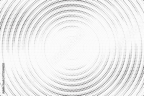 Radial halftone spotted and dotted gradient background. Concentric stains texture with fading effect. Black and white rough wallpaper. Grunge monochrome geometric backdrop. Vector illustration. © cnh