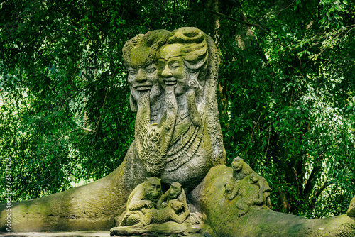 Statue in the Monkey Forest, Ubud, Bali, Indonesia. © Zenstratus