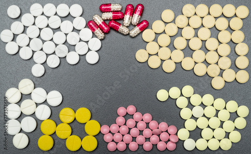 background with medicines. pills and capsules close-up for background photo