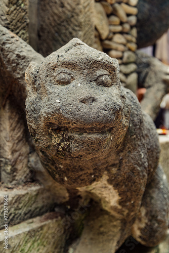 Moneky face statue at Monkey Forest Ubud, Bali, Indonesia. © Zenstratus