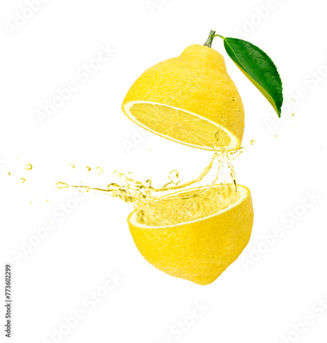 Lemon juice splash isolated on white photo