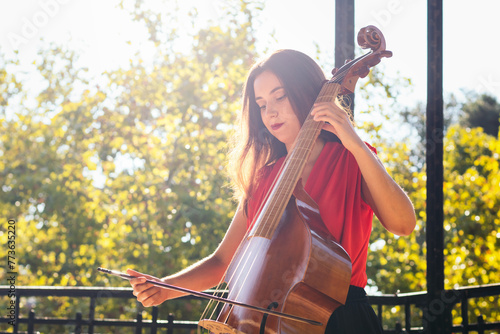 Woman musician playing cello