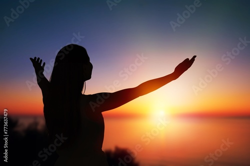 Portrait of happy young girl silhouette on sky background